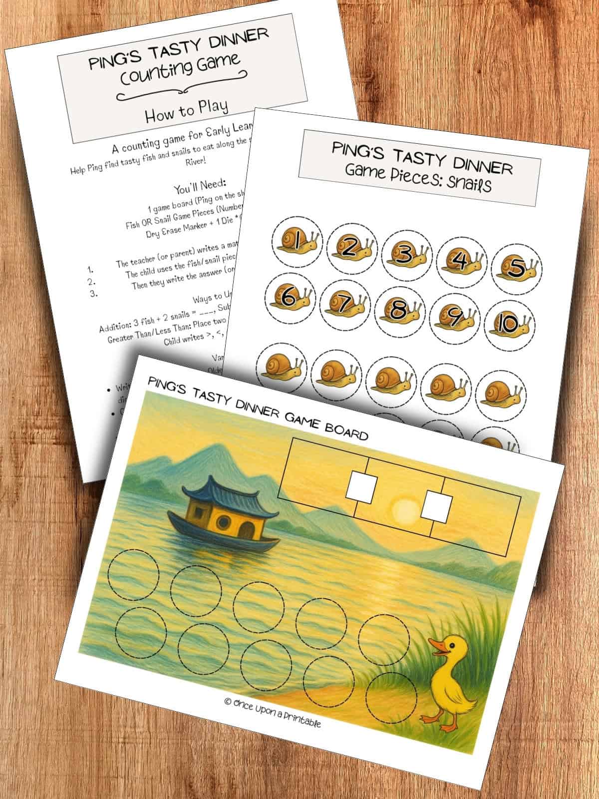 Ping's tasty dinner math game laying on a wooden table. 