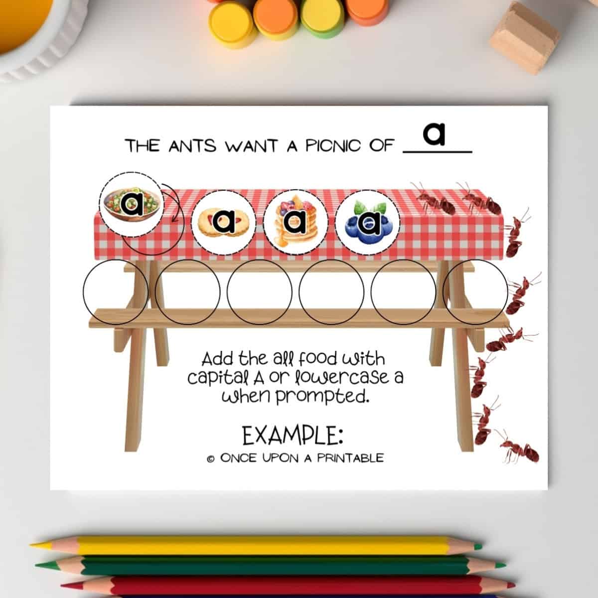 The Ants picnic game boa rd with lowercase a game pieces for example.