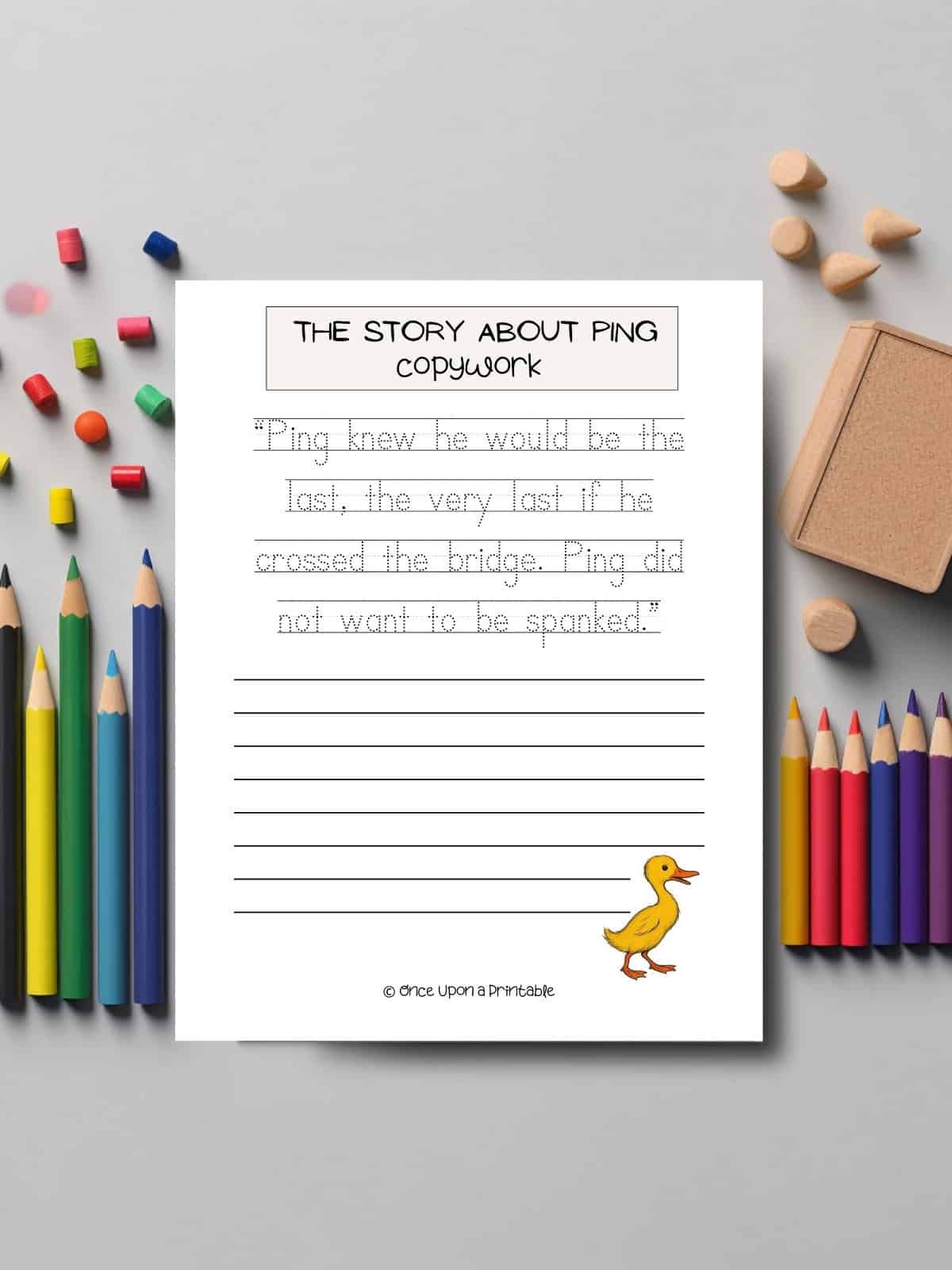 The story about ping copywork pages laying on a table with coloring pencils. 