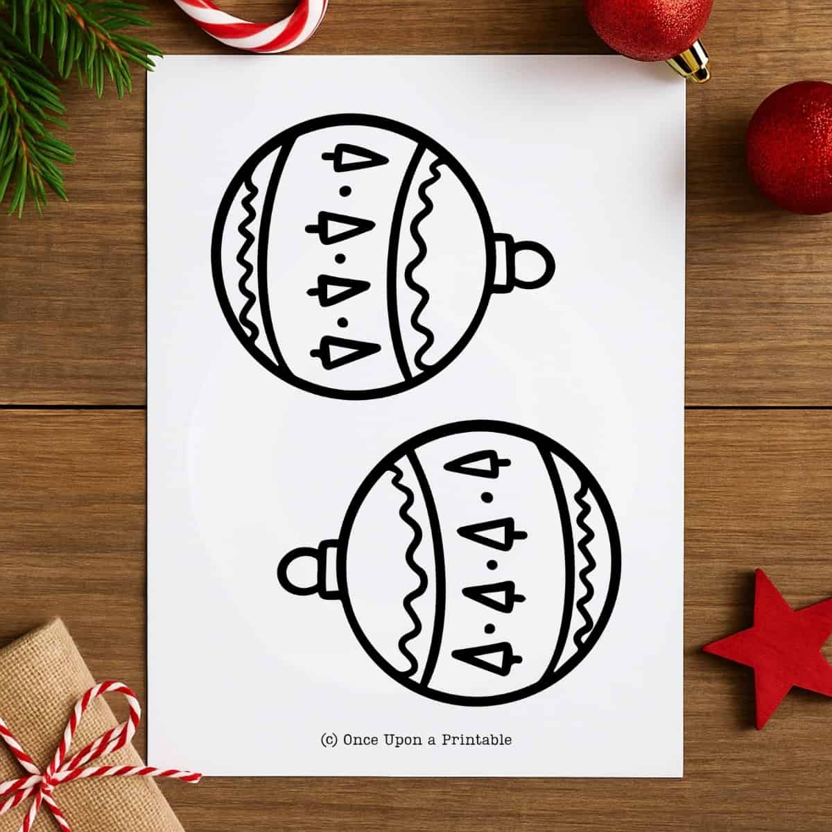 Christmas ornament template printable with two decorated ornaments.