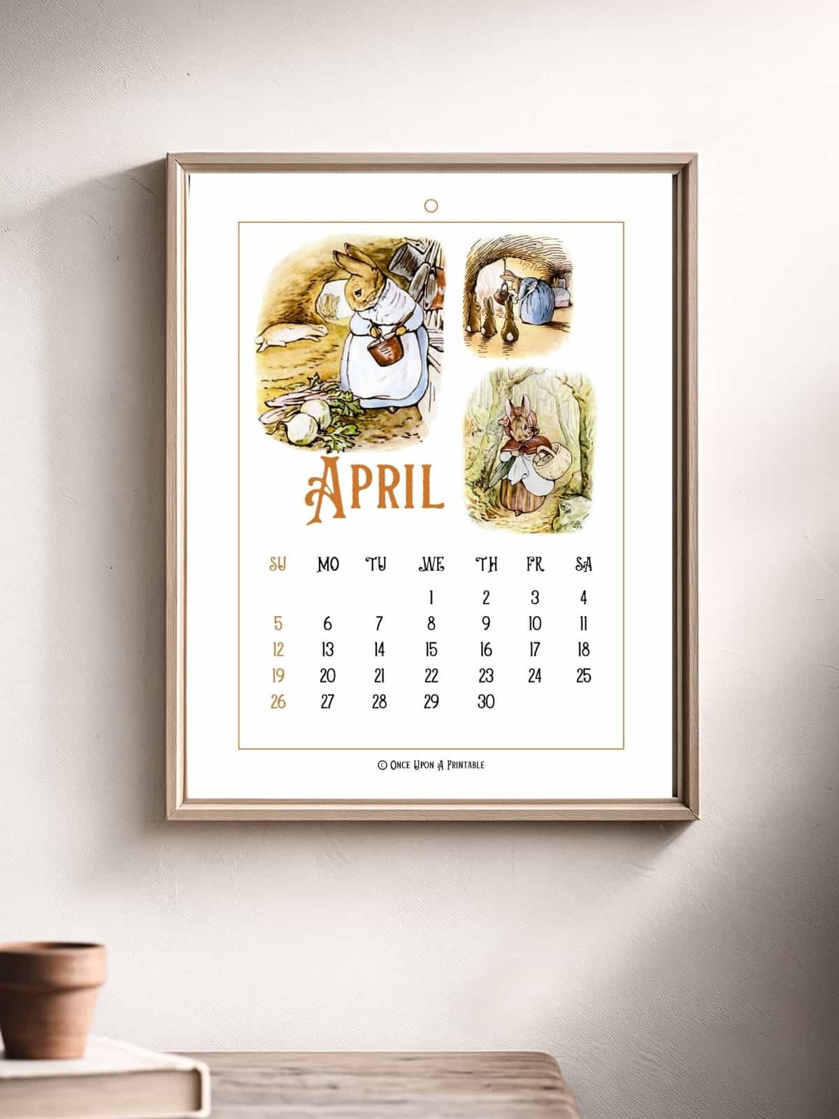 Framed Peter rabbit themed calendar with original illustrations, April.