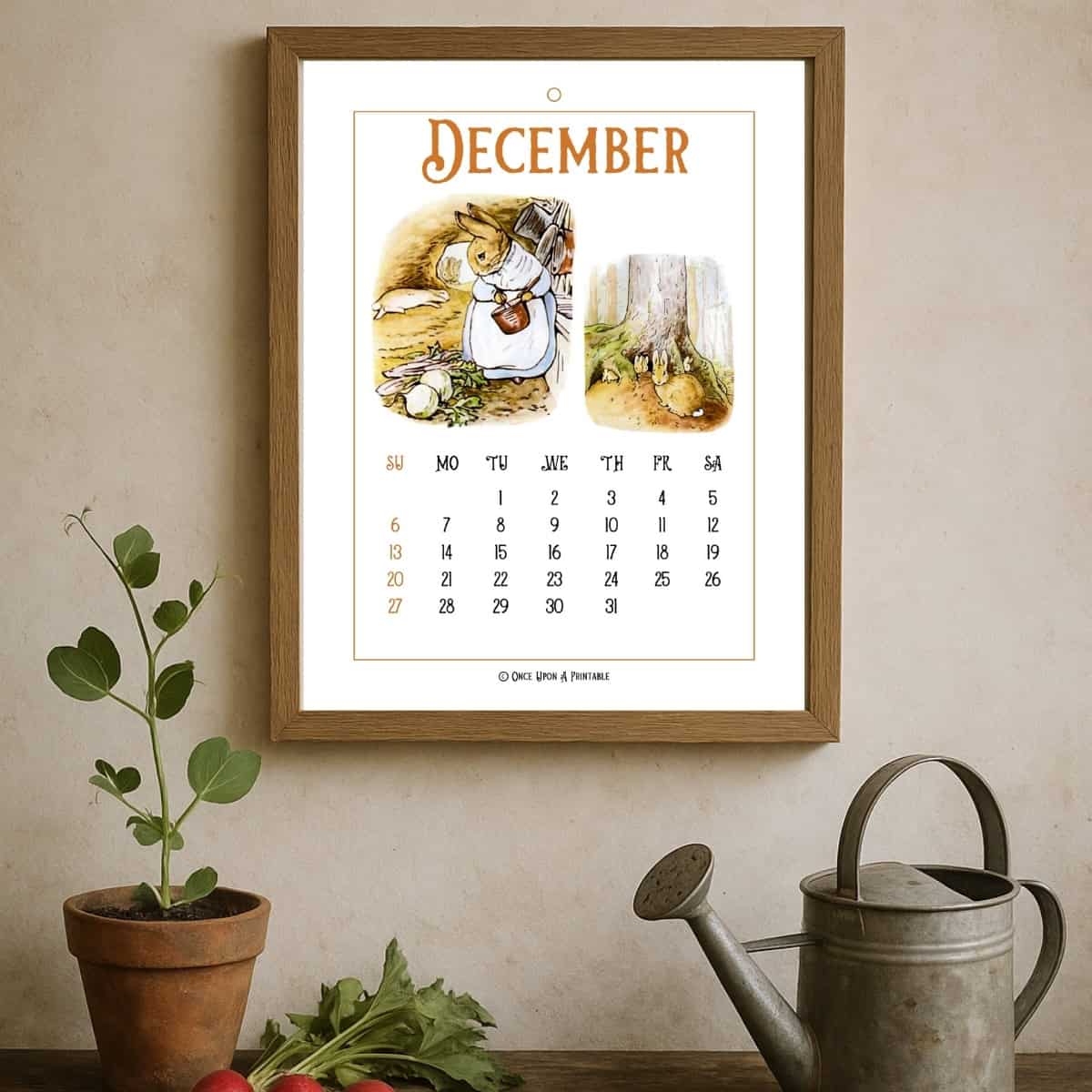 Peter Rabbit illustrated January calendar in a frame with a woman holding it next to Iris's in a vase.