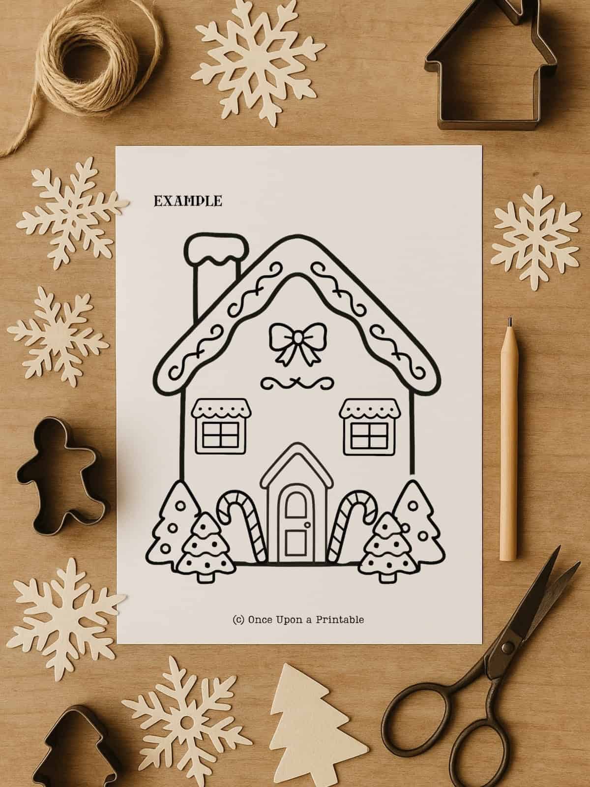Gingerbread house craft example page with crafting tools.
