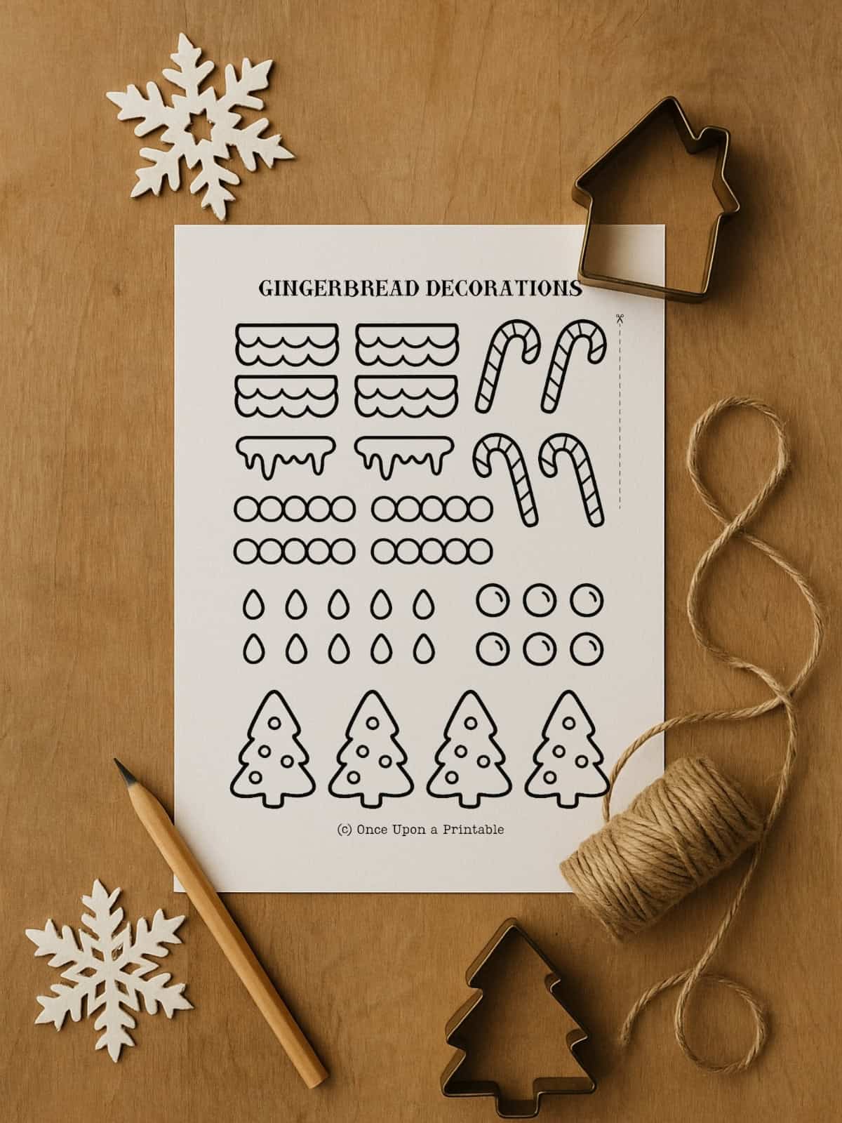 Gingerbread house craft decorations page with peppermint sticks, trees, snow drifts, and candy.